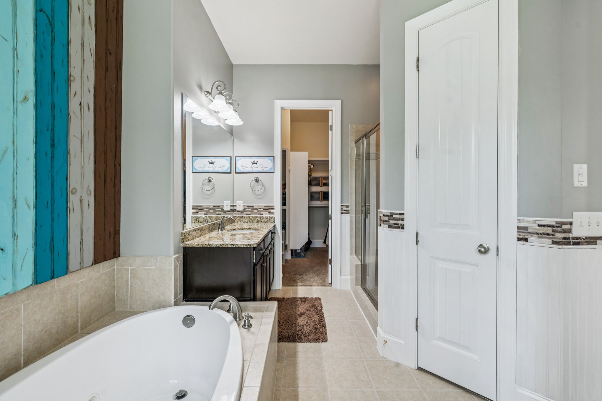 1501 Registry Row Arrington, TN 37014 - Photo 27 of 77 a bathroom with a tub sink and mirror