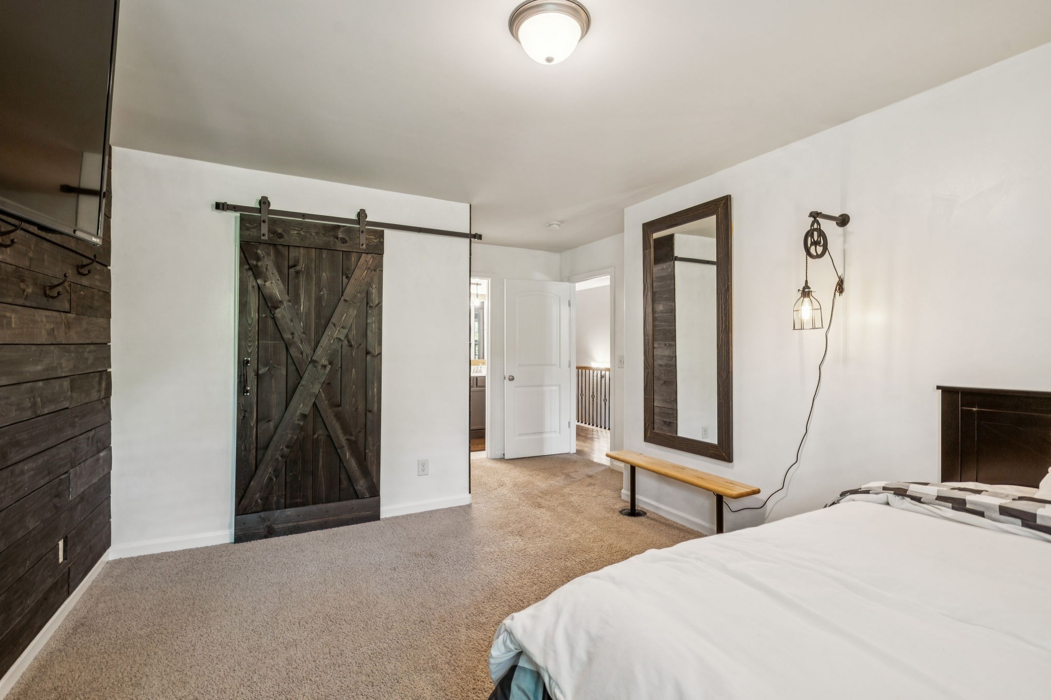 1501 Registry Row Arrington, TN 37014 - Photo 38 of 77 a bedroom with a bed and a flat screen tv