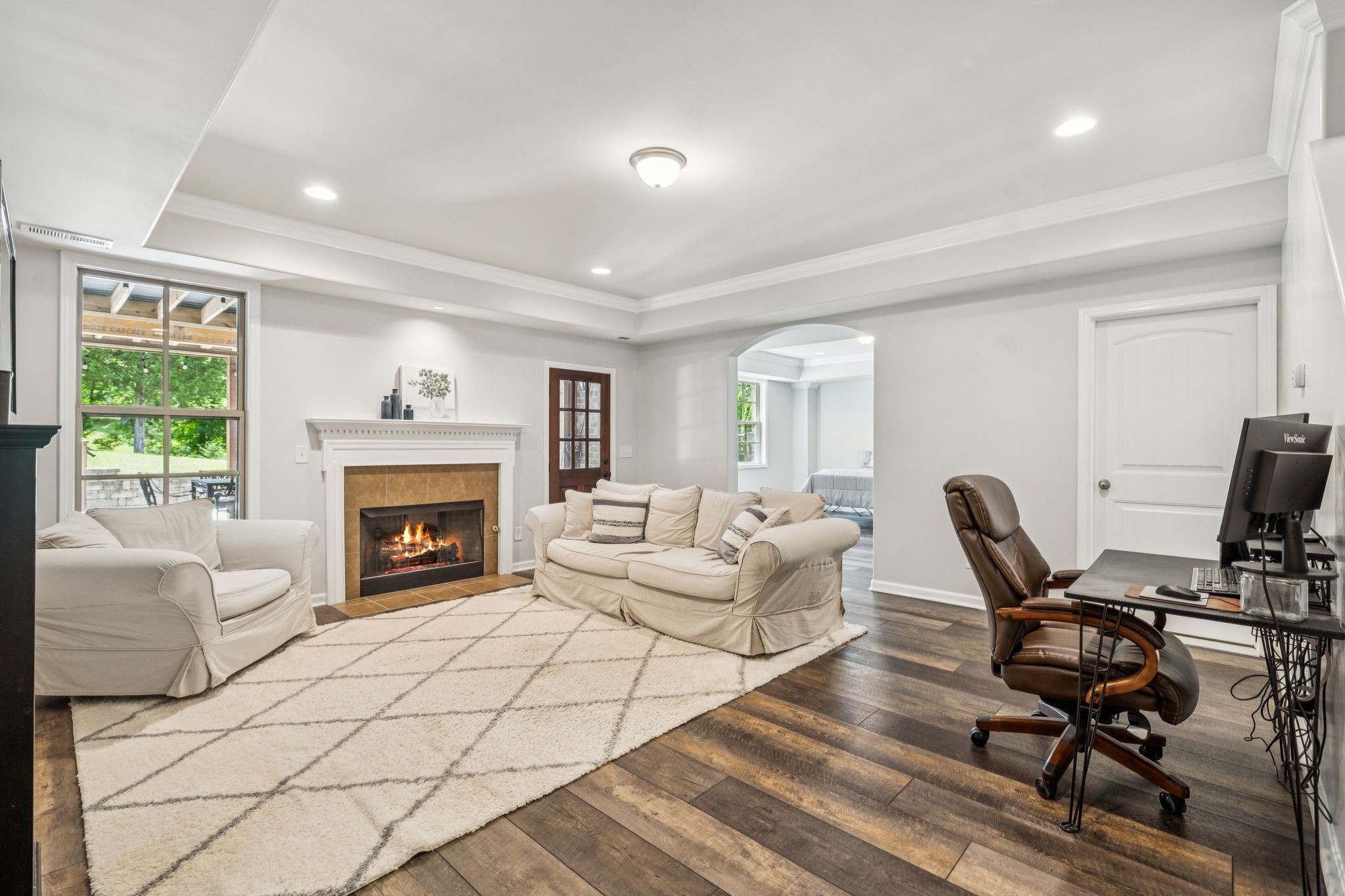1501 Registry Row Arrington, TN 37014 - Photo 44 of 77 a living room with furniture a fireplace and a table