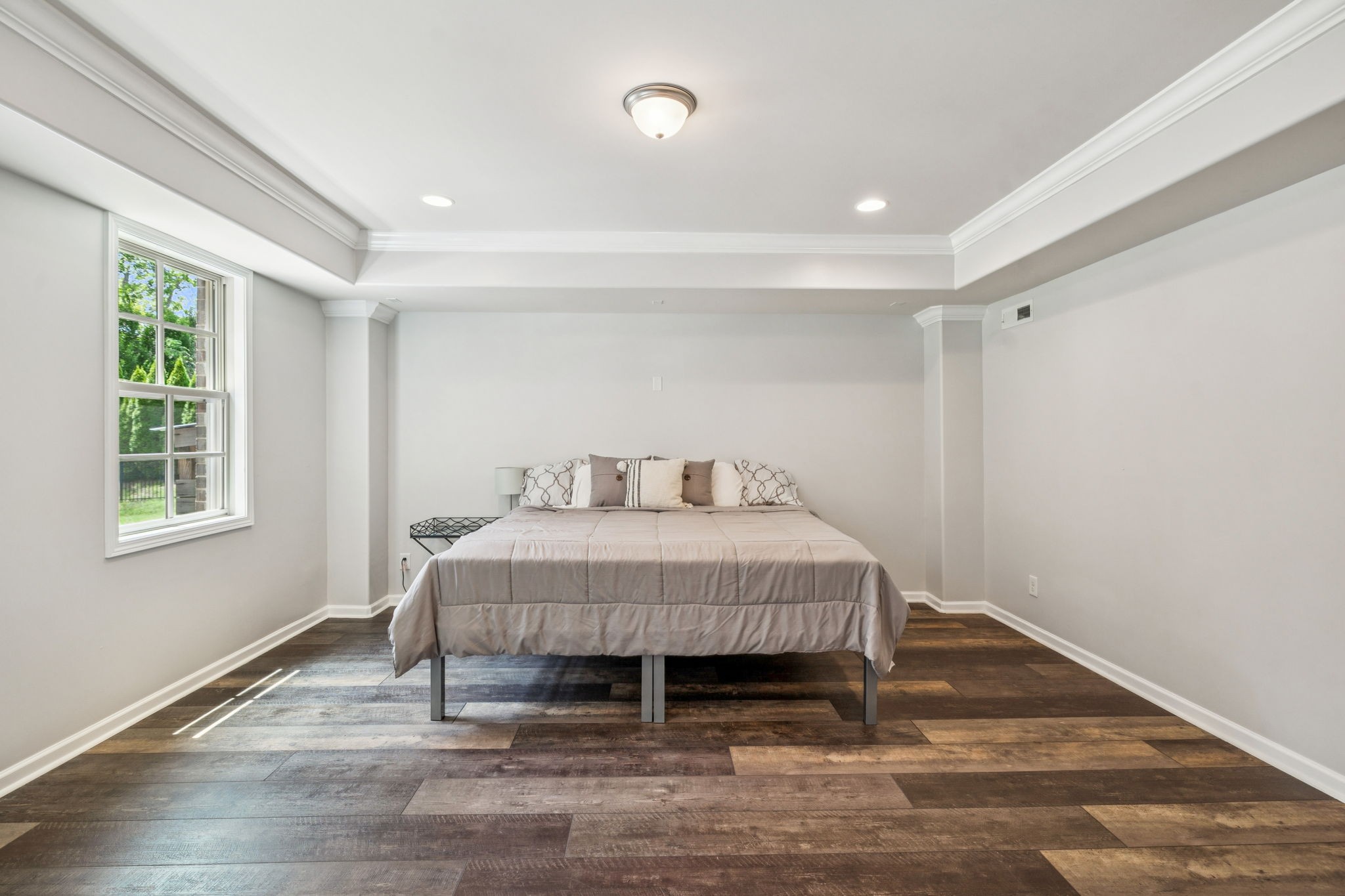 1501 Registry Row Arrington, TN 37014 - Photo 51 of 77 a bedroom with a bed and wooden floor