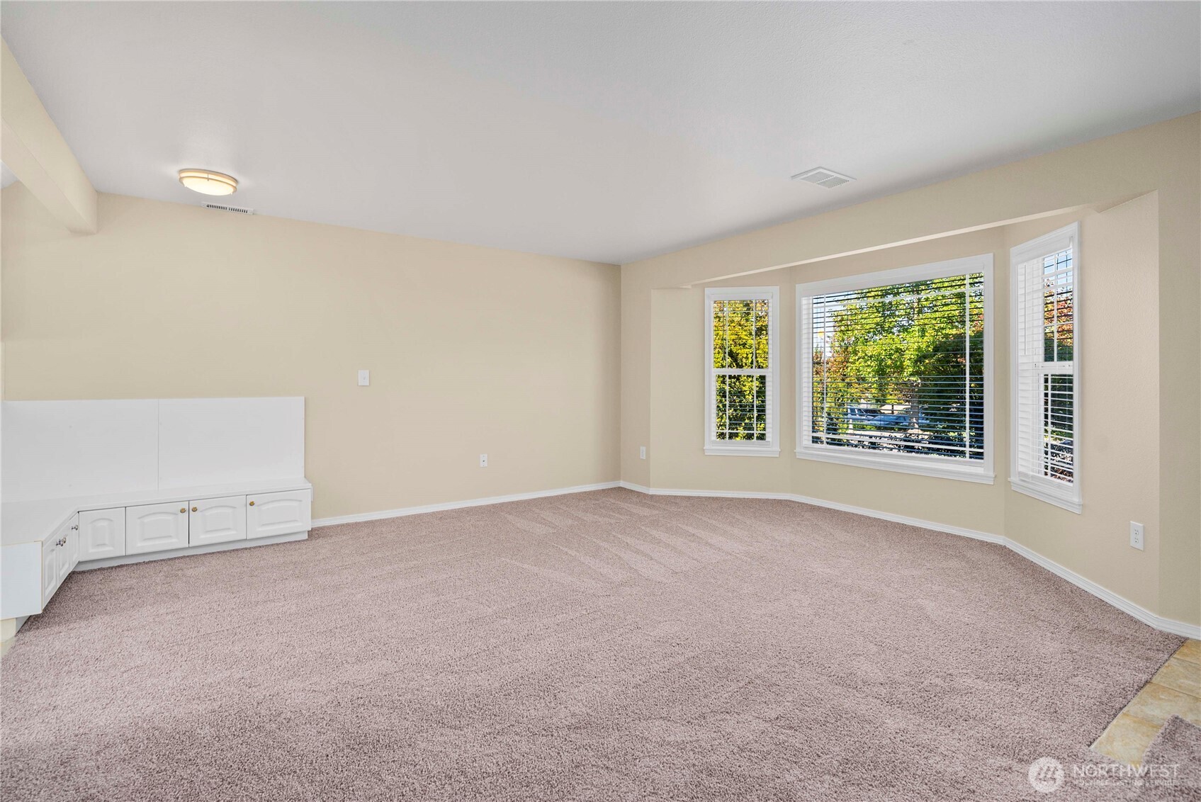 1617 Northeast 28th Street Renton, WA 98056 - Photo 9 of 33 an empty room with windows
