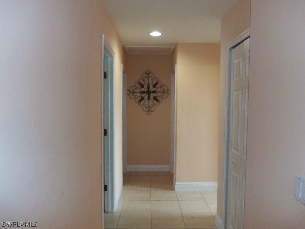 462 Rajah Street Lehigh Acres, FL 33974 - Photo 14 of 17 a view of a hallway