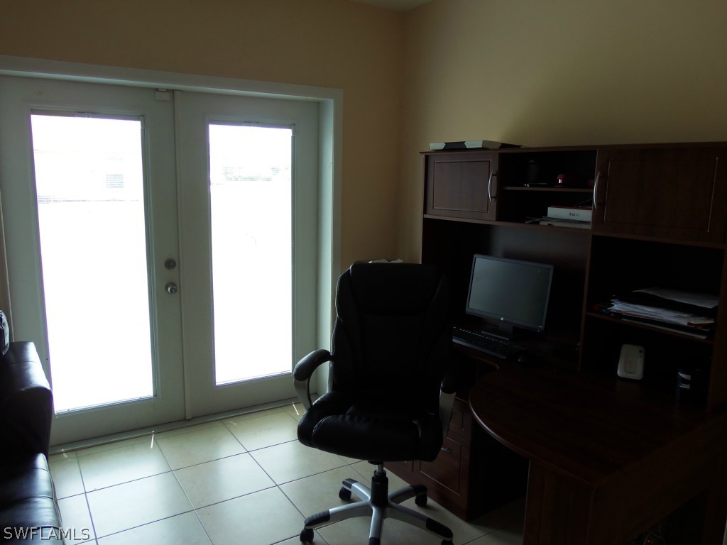 462 Rajah Street Lehigh Acres, FL 33974 - Photo 17 of 17 a view of workspace with windows