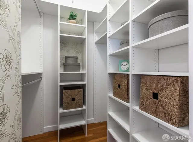 a view of an empty walk in closet