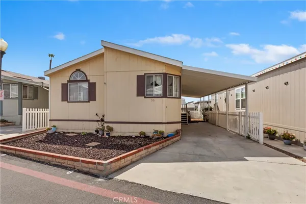a front view of a house with garage