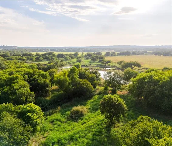 a view of a lake with mountains in the background
