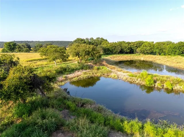 a view of an ocean and houses