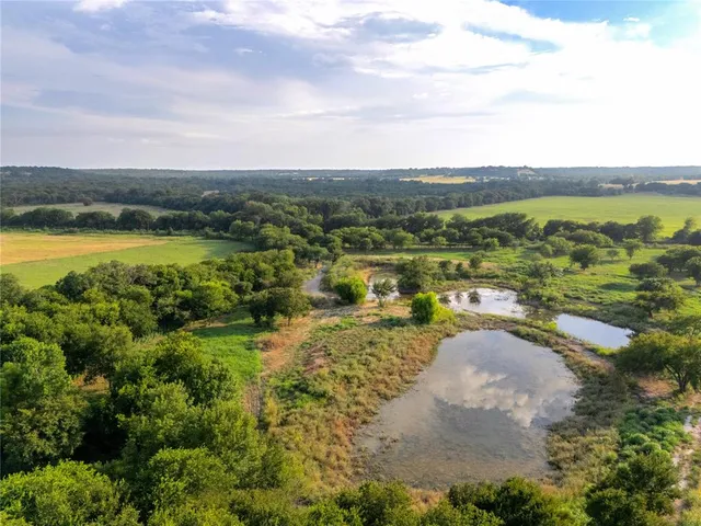 a view of a lake with an outdoor space