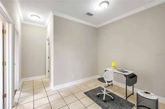 a workspace with furniture and a window