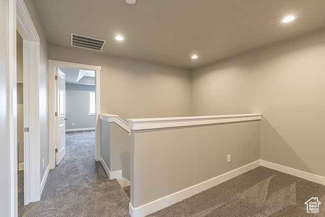 2242 South 1120 West, Unit 69 Logan, UT 84321 - Photo 14 of 26 Corridor featuring an upstairs landing, dark carpet, and recessed lighting