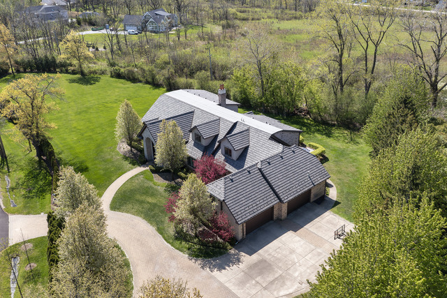 1630 Ridge Road Highland Park, IL 60035 - Photo 3 of 63 an aerial view of a house with garden space and lake view