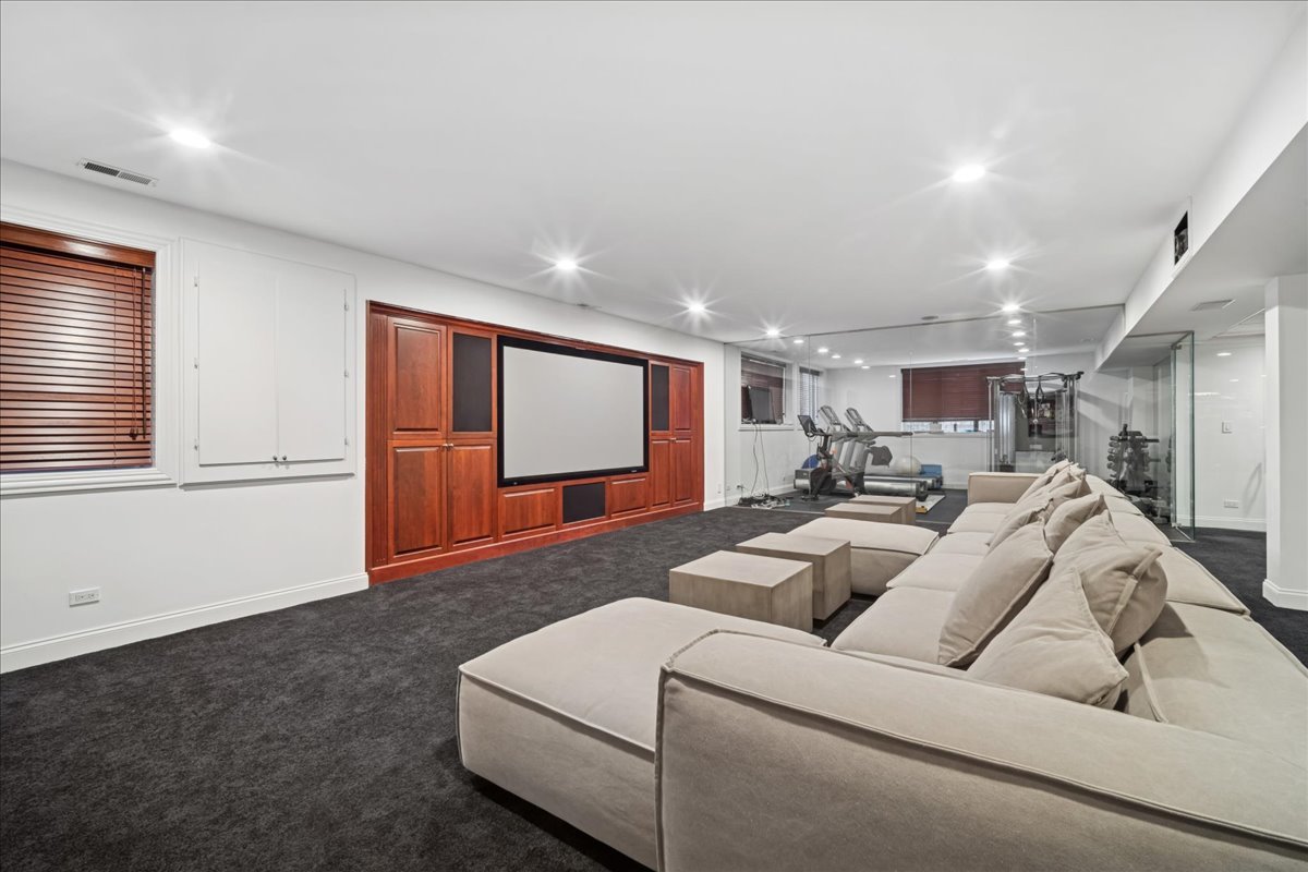 1630 Ridge Road Highland Park, IL 60035 - Photo 42 of 63 a living room with furniture and a flat screen tv