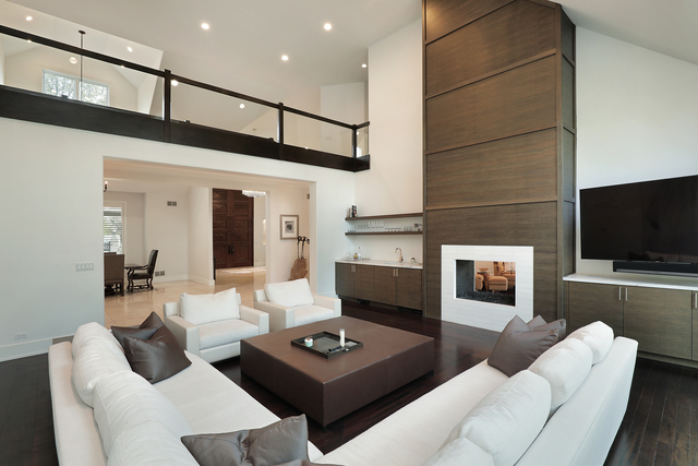 1630 Ridge Road Highland Park, IL 60035 - Photo 8 of 63 a living room with furniture a flat screen tv and a fireplace