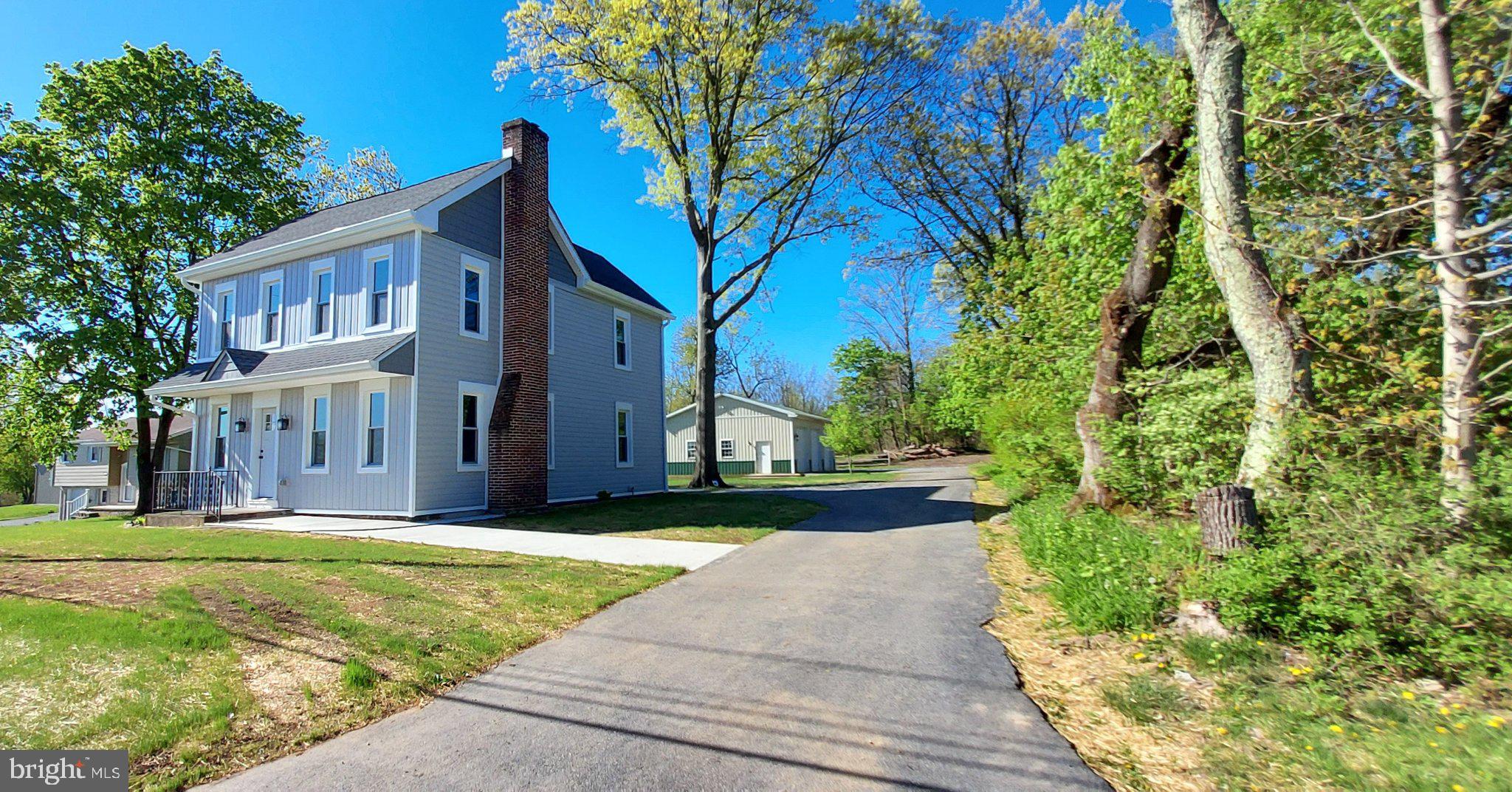 128 Maugers Mill Road Pottstown, PA 19464 - Photo 2 of 42 Charming home nestled among trees.