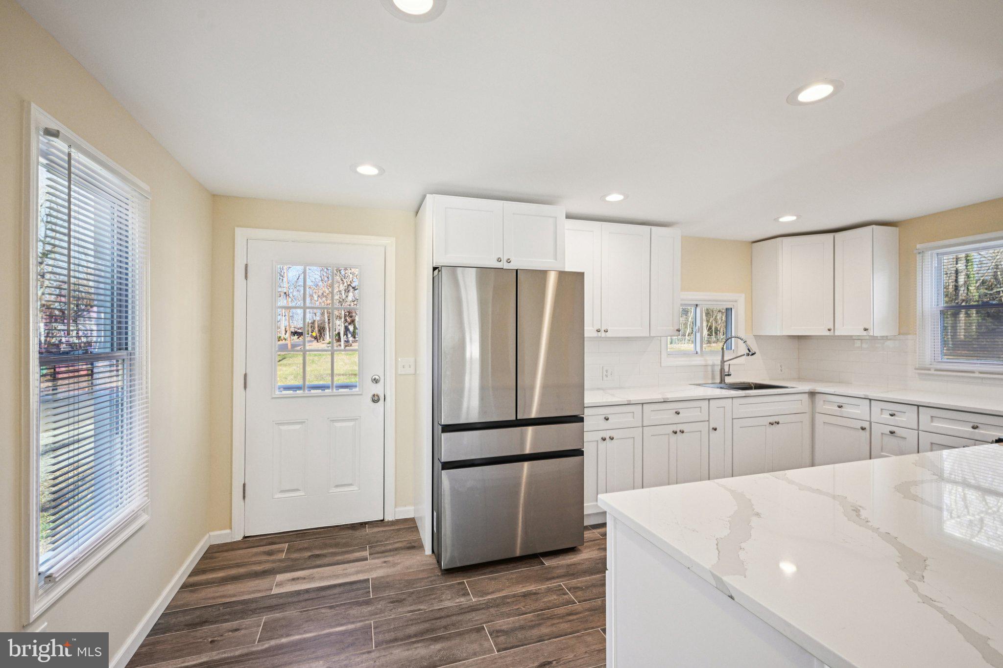 195 Chews Landing Road Clementon, NJ 08021 - Photo 13 of 48 a kitchen with a refrigerator stove and sink