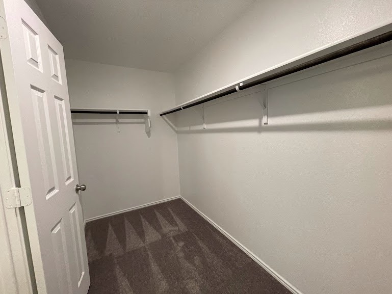640 Pickrell Loop Georgetown, TX 78628 - Photo 22 of 36 a view of a room with racks on the wall