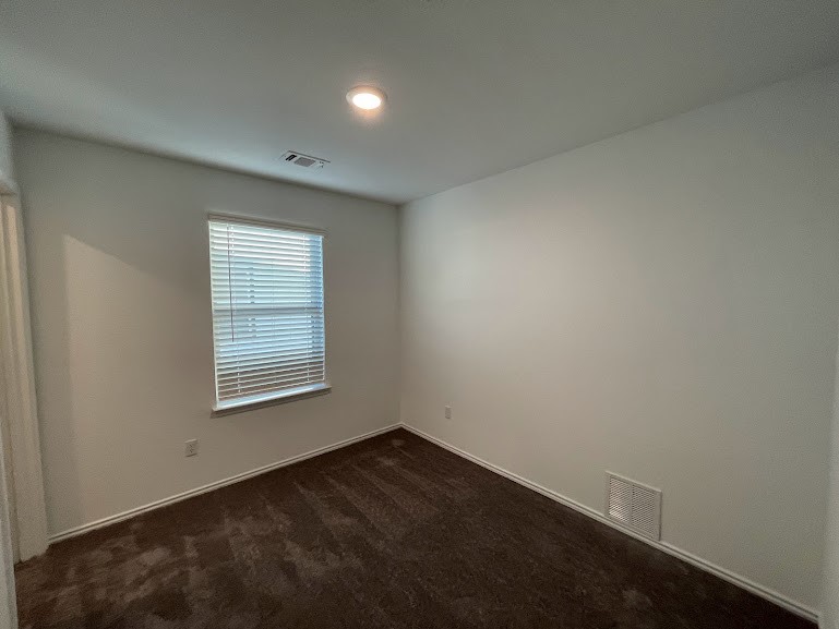 640 Pickrell Loop Georgetown, TX 78628 - Photo 25 of 36 an empty room with a window