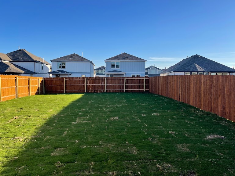 640 Pickrell Loop Georgetown, TX 78628 - Photo 34 of 36 a view of a house with a yard and sitting area