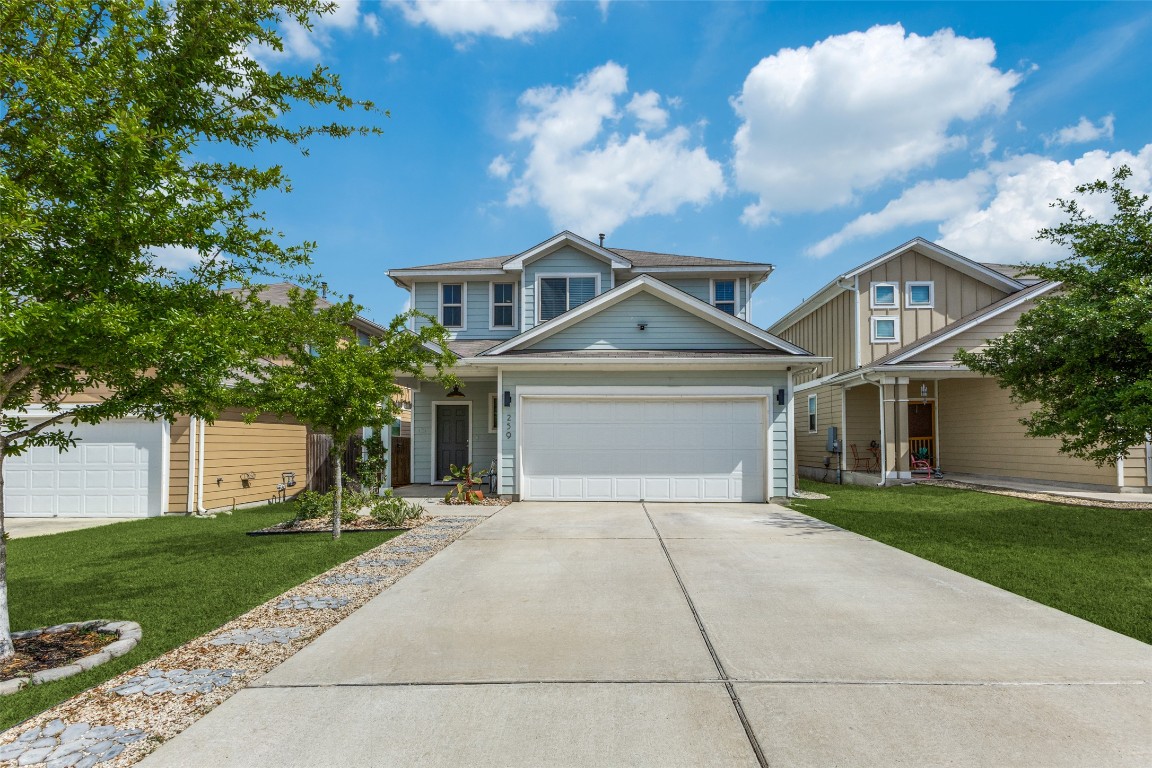 259 Guemal Road Buda, TX 78610 - Photo 1 of 1 front view of a house with a yard