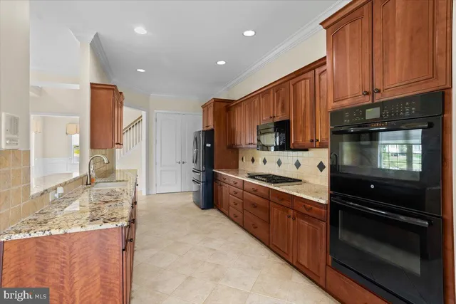 a view of storage and utility room with washer and dryer