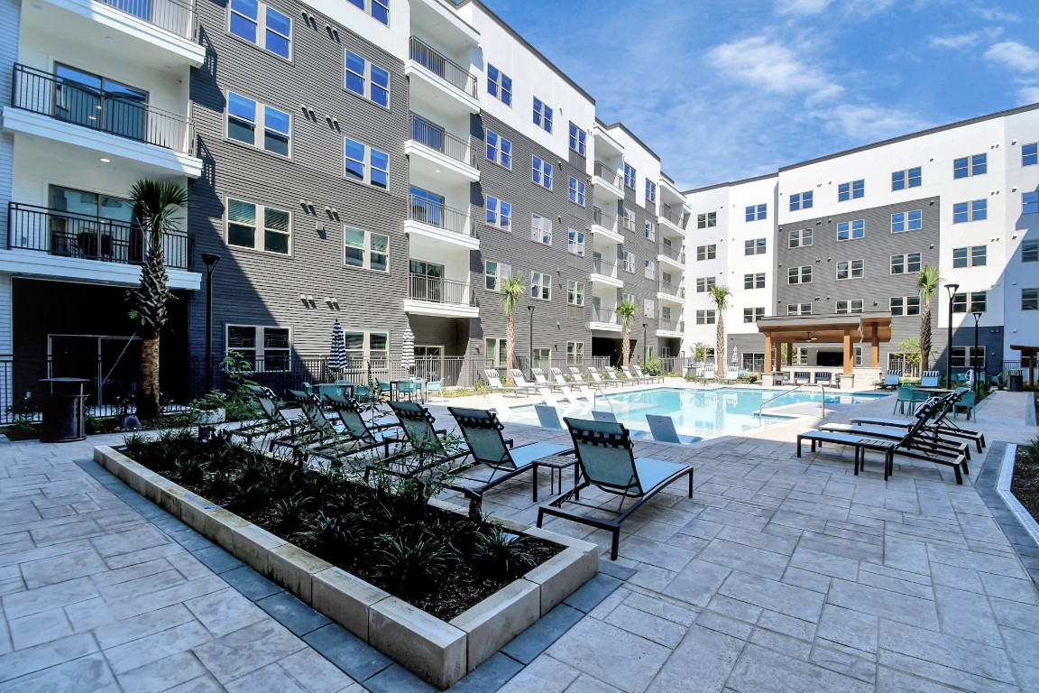 a view of a chairs and tables in the patio