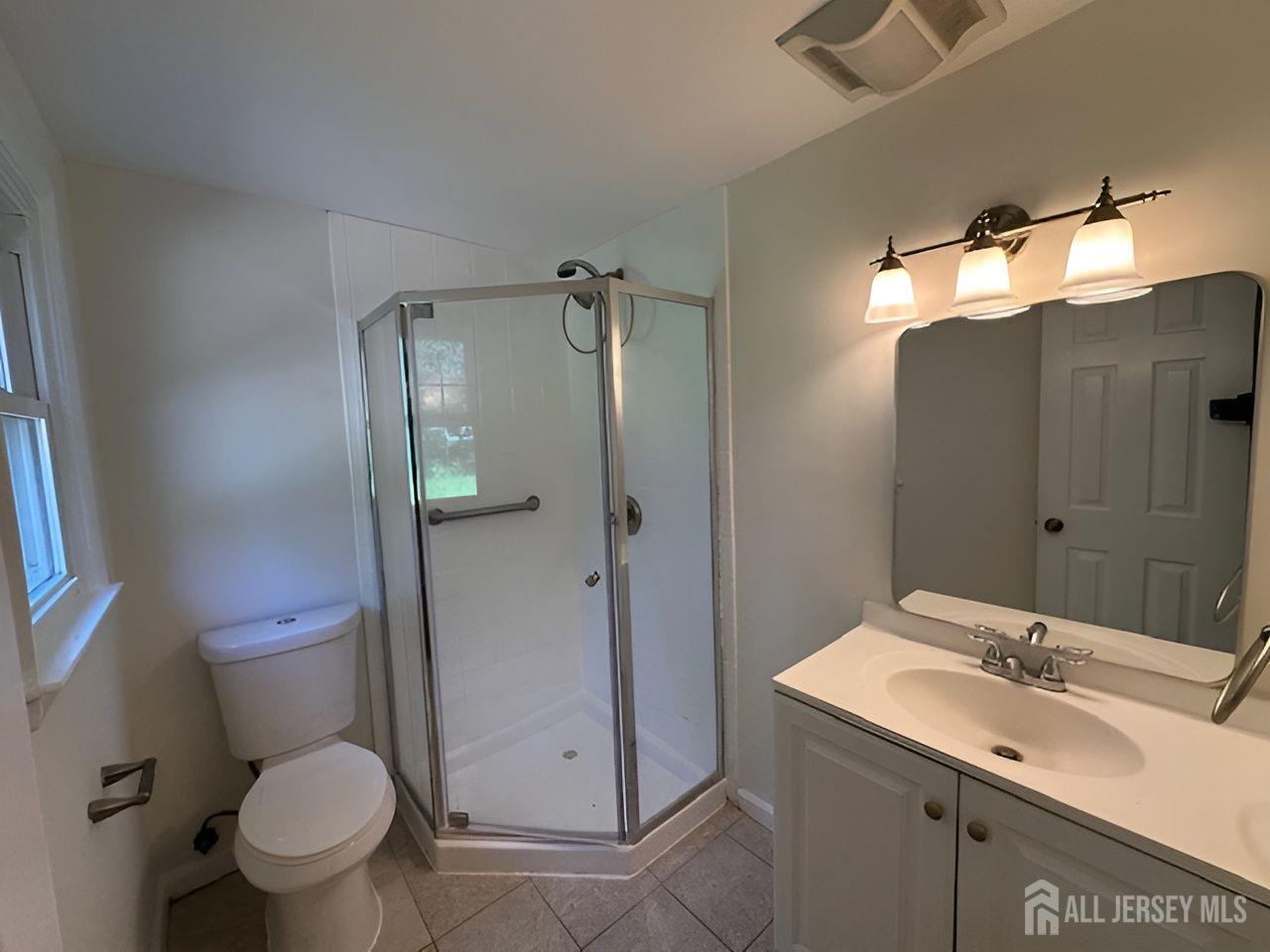 12 Ziff Lane West Windsor, NJ 08550 - Photo 14 of 19 a bathroom with a sink toilet and shower