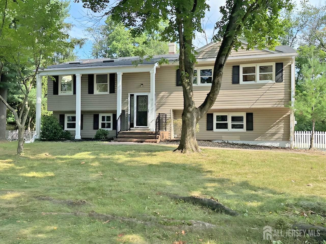 12 Ziff Lane West Windsor, NJ 08550 - Photo 18 of 19 a front view of a house with a yard