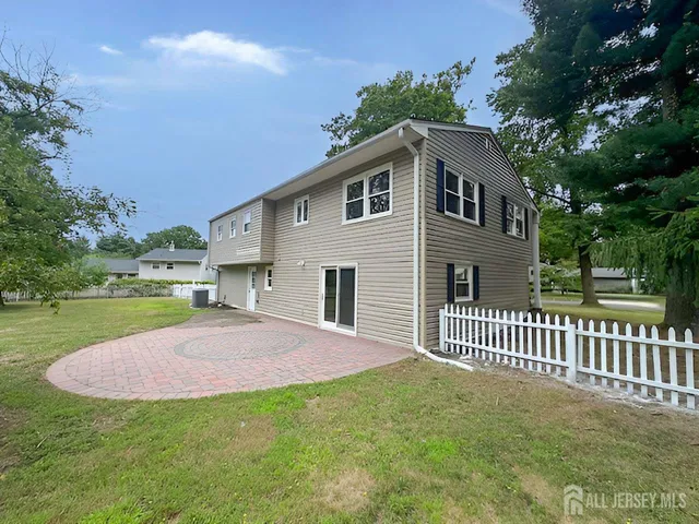 a house with garden in front of it
