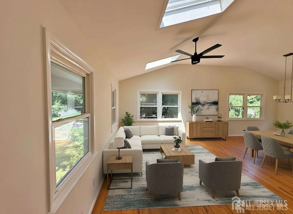12 Ziff Lane West Windsor, NJ 08550 - Photo 2 of 19 a living room with furniture large window and wooden floor