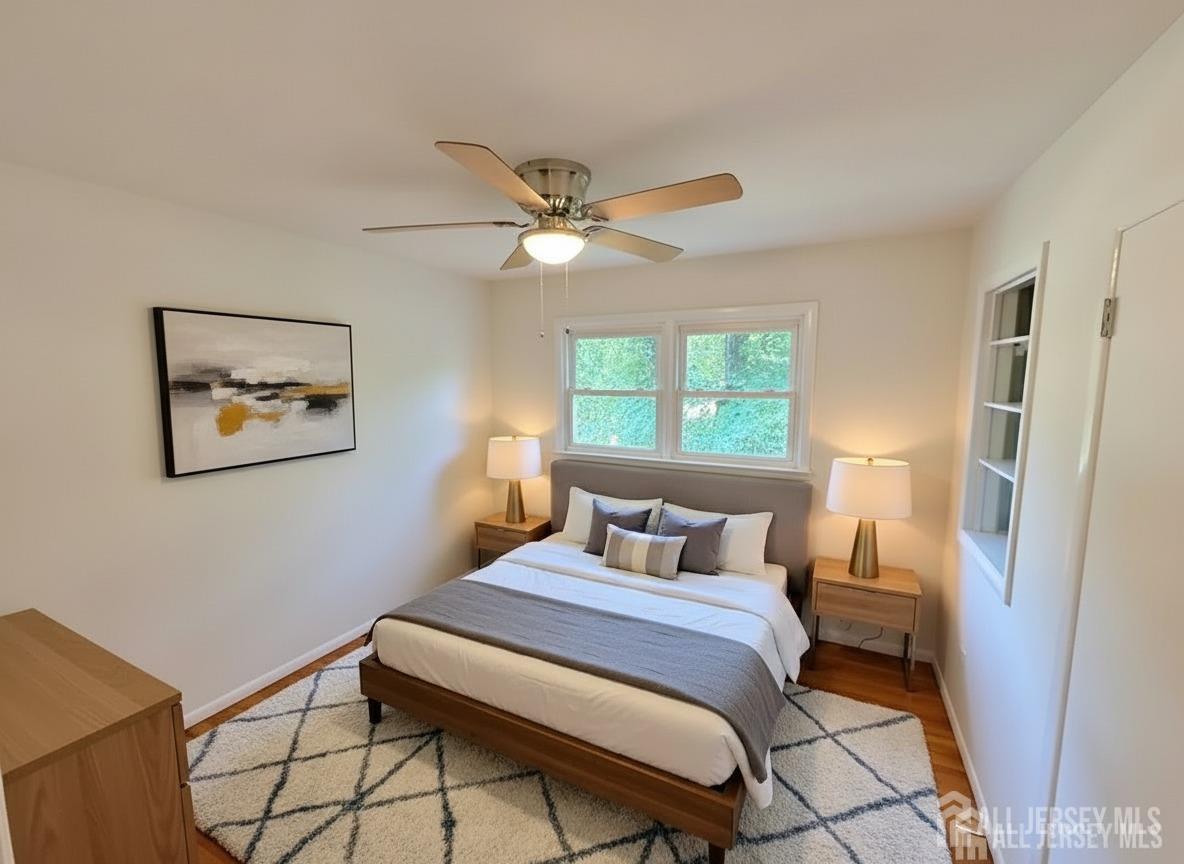 12 Ziff Lane West Windsor, NJ 08550 - Photo 8 of 19 a bedroom with a bed and a window