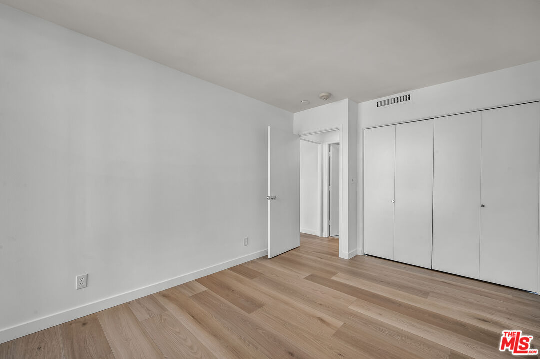 2160 Century Park, Unit 1911 Los Angeles, CA 90067 - Photo 19 of 26 a view of a room with wooden floor