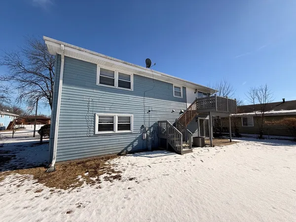 a view of a house covered in snow