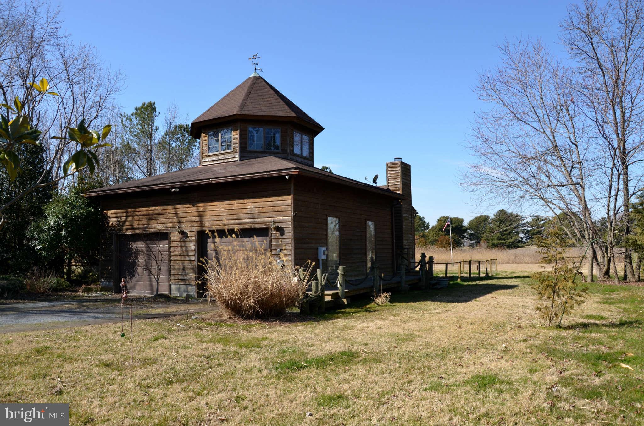 103 Parks Road Chester, MD 21619 - Photo 22 of 25 a front view of a house with a yard