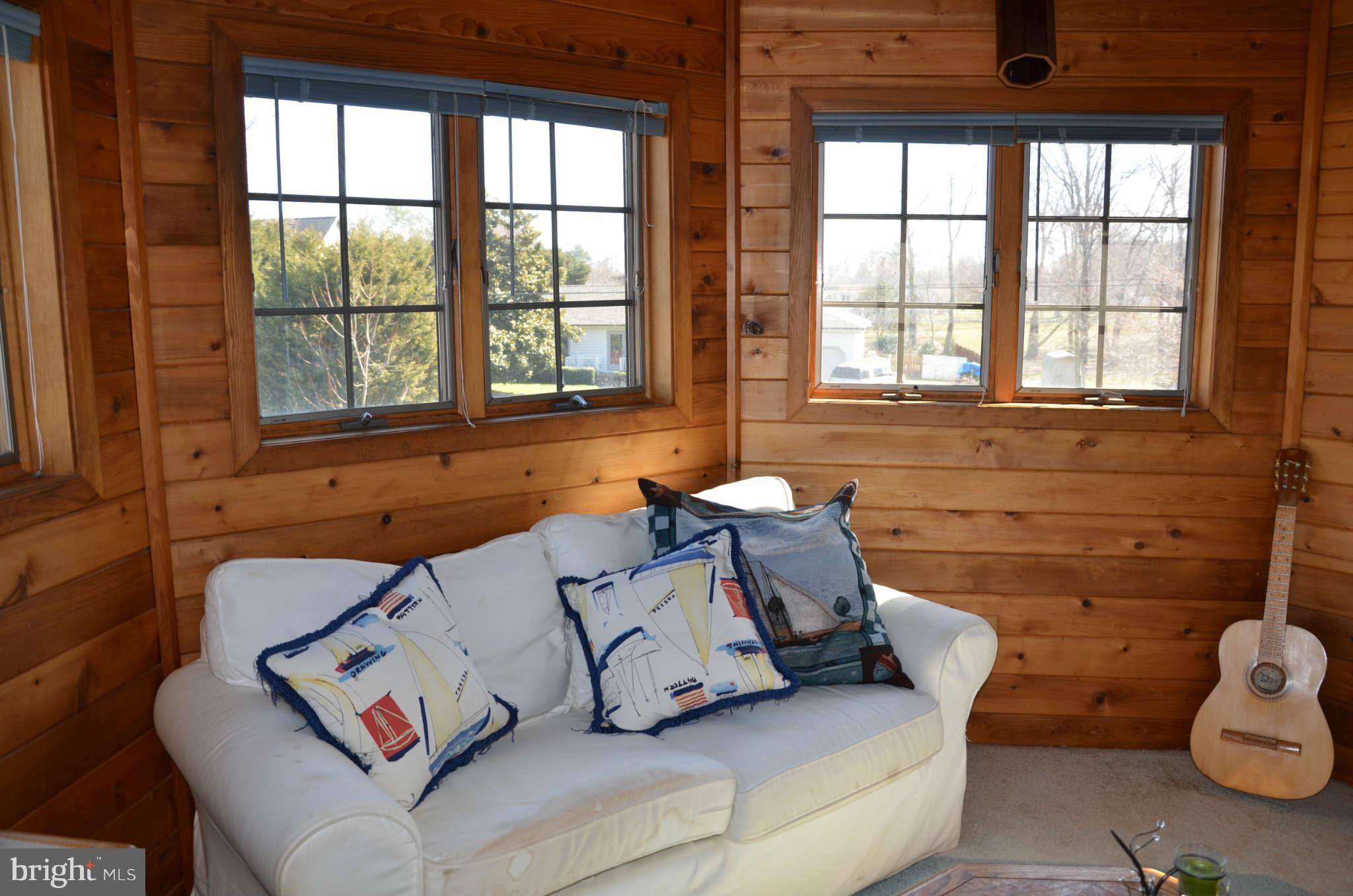 103 Parks Road Chester, MD 21619 - Photo 5 of 25 a living room with furniture and a window