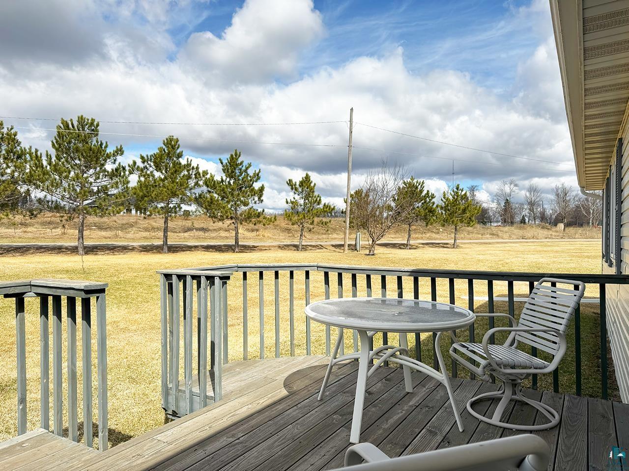 197 Jefferson Street Buhl, MN 55713 - Photo 31 of 31 Deck with a lawn