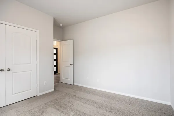 an empty room with closet