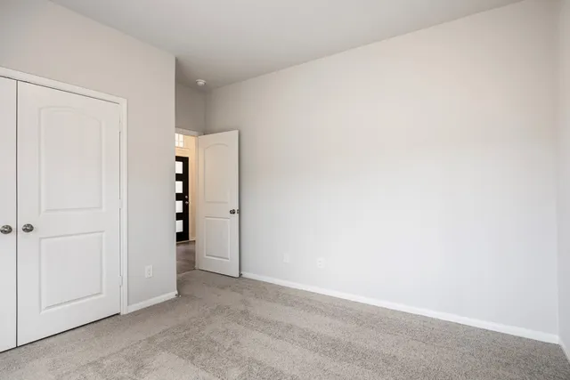 an empty room with closet