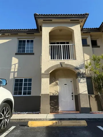 a front view of a house with swimming pool