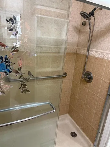 a kitchen with a sink a stove and cabinets