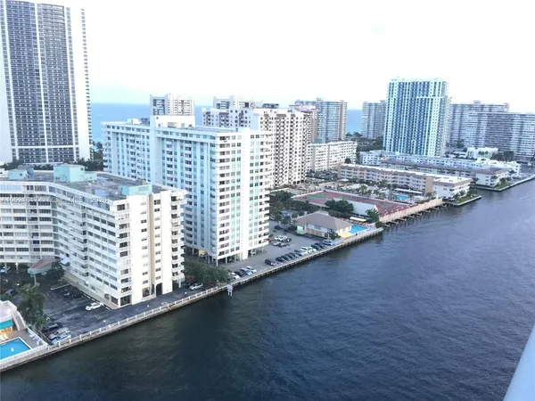 a view of a city with tall buildings