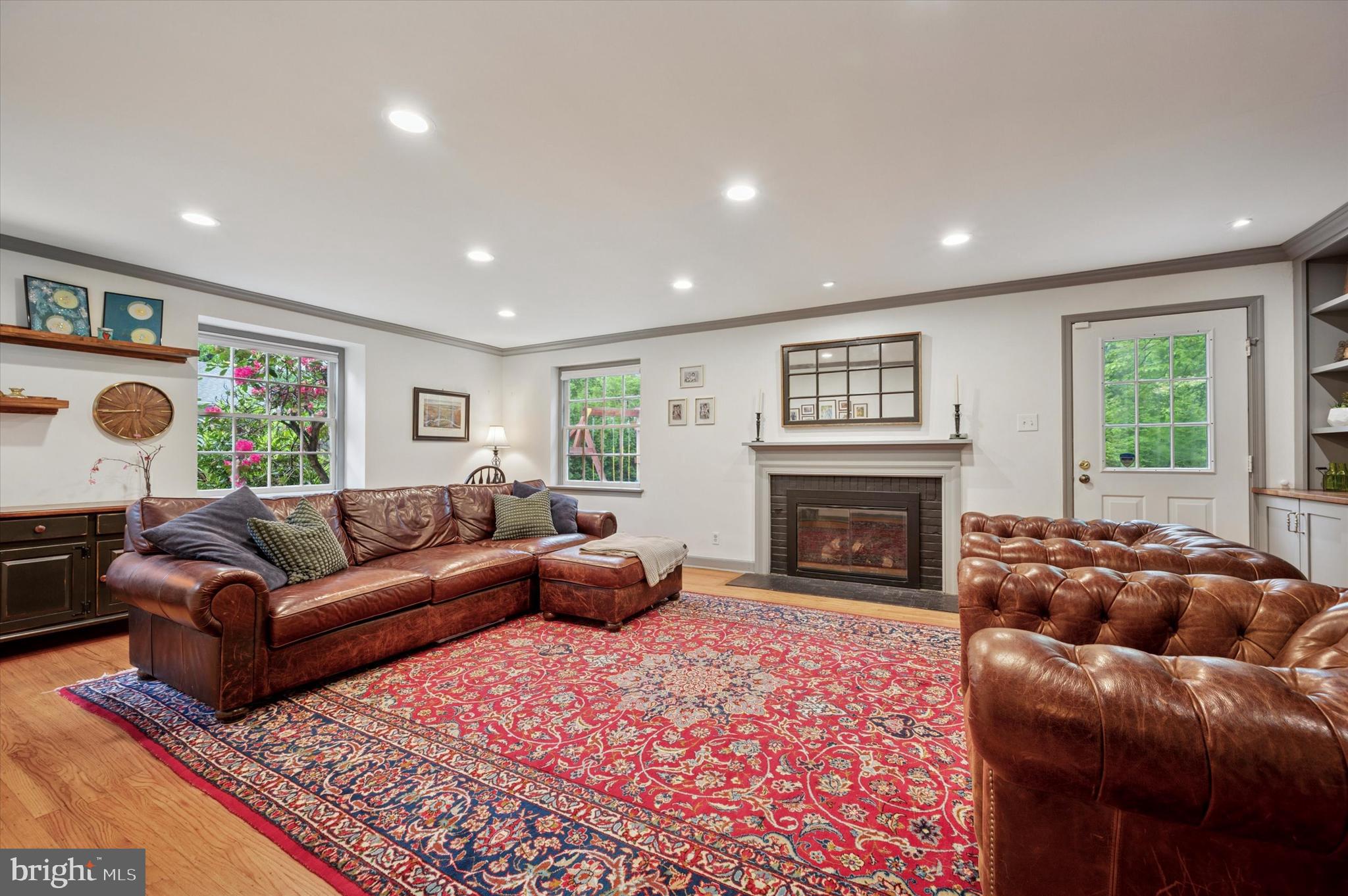 1205 Red Rambler Road Rydal, PA 19046 - Photo 10 of 34 a living room with furniture a window and a fireplace