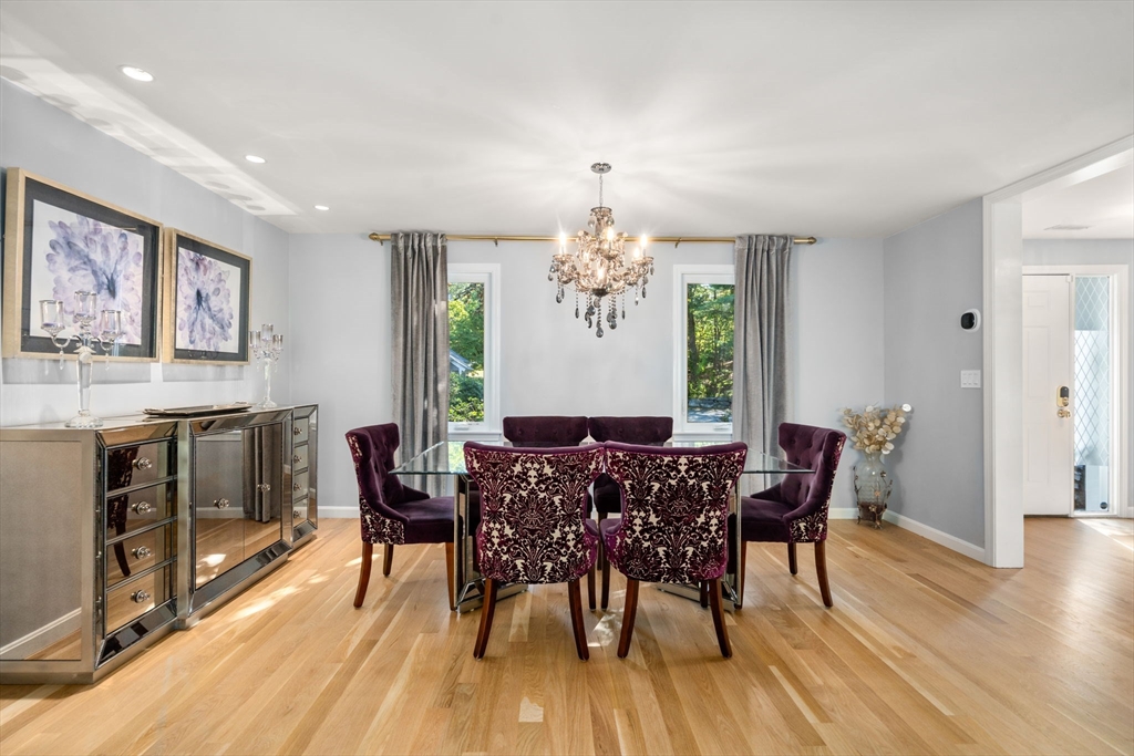 16 Coltsway, Unit 16 Wayland, MA 01778 - Photo 13 of 29 a view of a dining room with furniture window and wooden floor