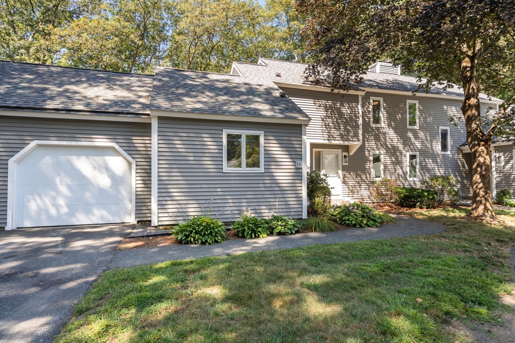 16 Coltsway, Unit 16 Wayland, MA 01778 - Photo 27 of 29 a front view of a house with garden