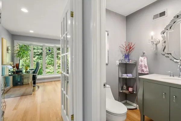 a bathroom with a sink toilet and a tub