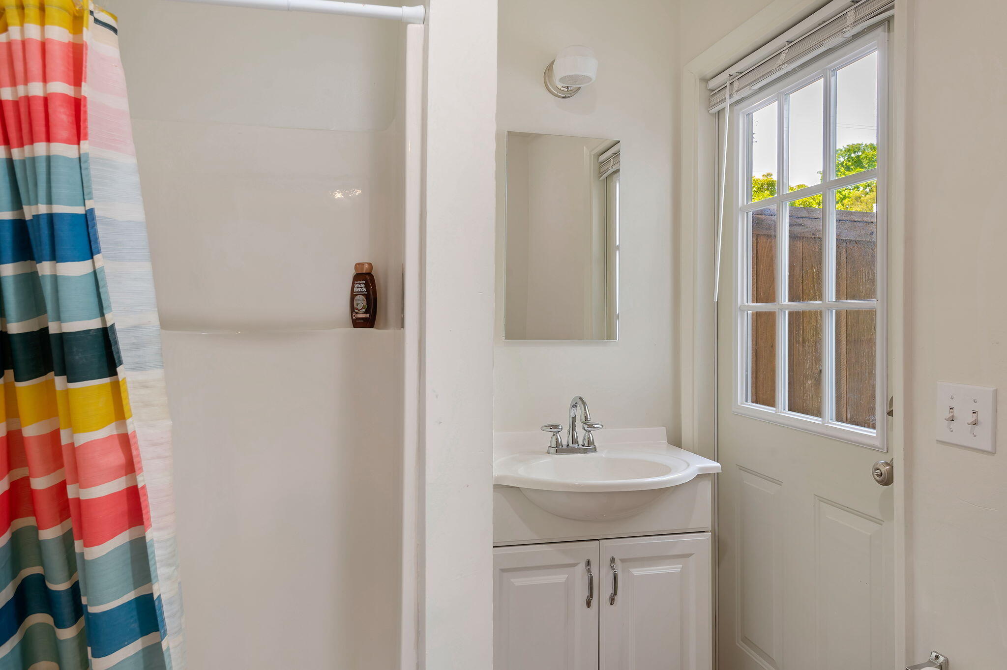 419 Barling Terrace Goleta, CA 93117 - Photo 12 of 17 a bathroom with a sink vanity and a mirror