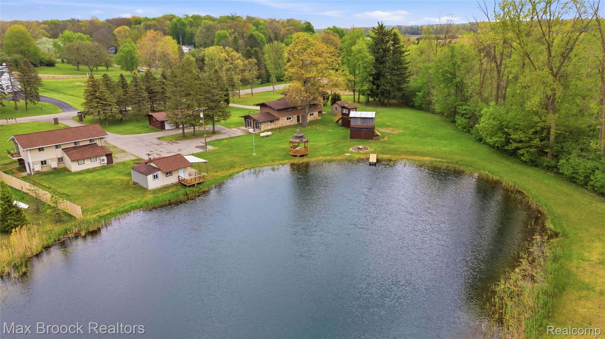 1392 Maple Grove Road Lapeer, MI 48446 - Photo 2 of 70 Bird's eye view of a large body of water