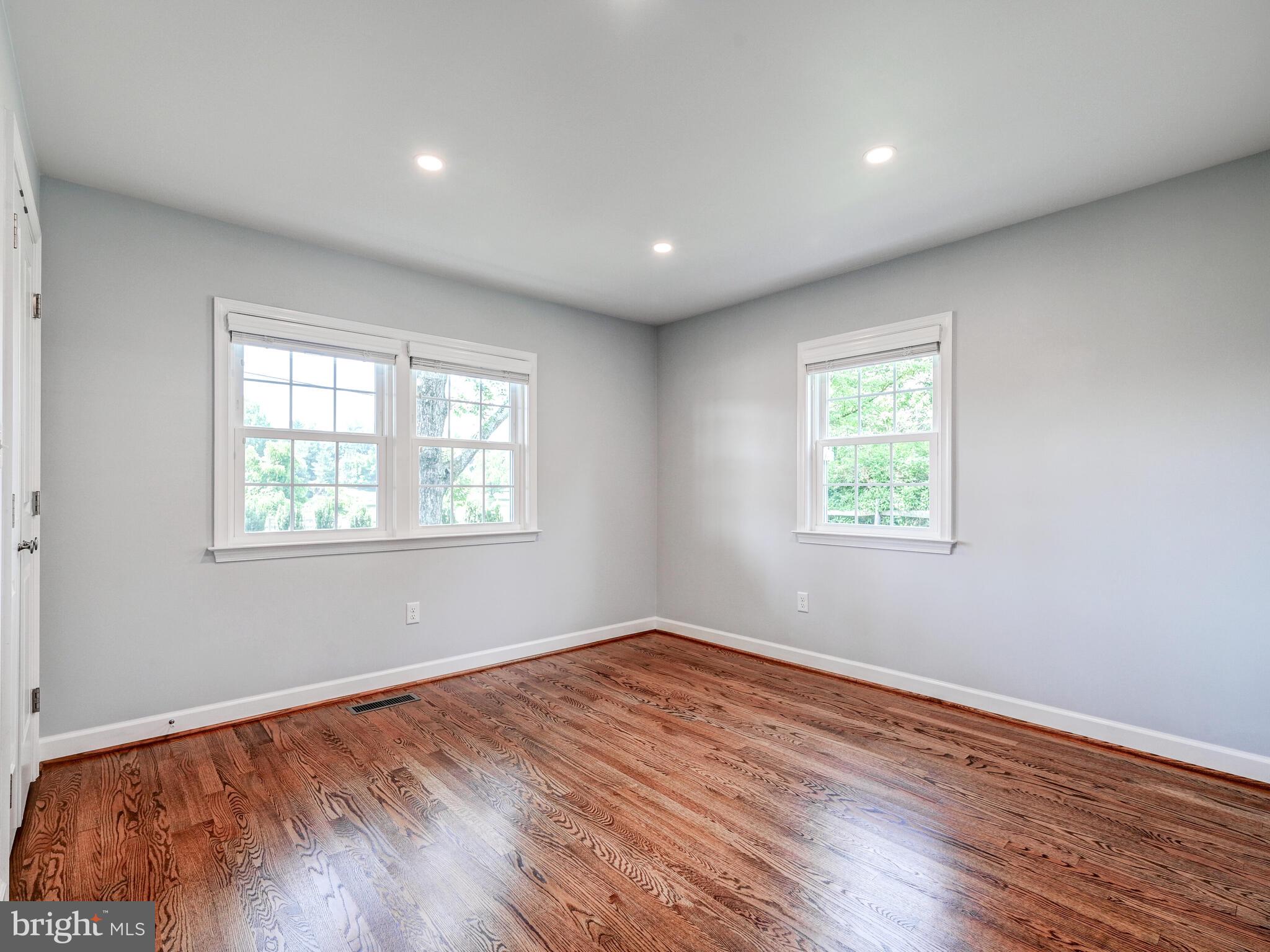 3322 Hess Road Monkton, MD 21111 - Photo 11 of 22 an empty room with wooden floor and windows