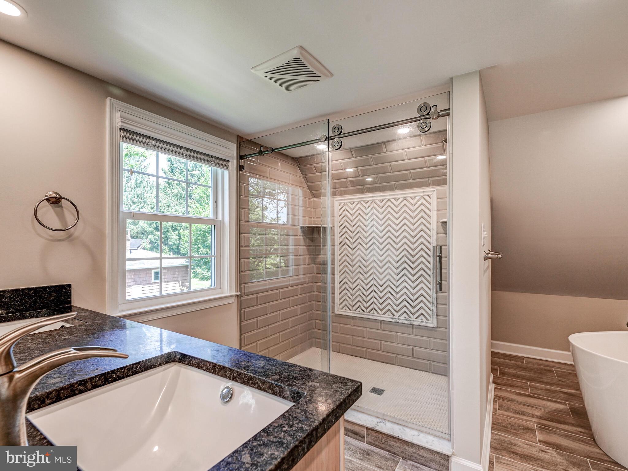 3322 Hess Road Monkton, MD 21111 - Photo 17 of 22 a view of a bathroom with a tub and a shower