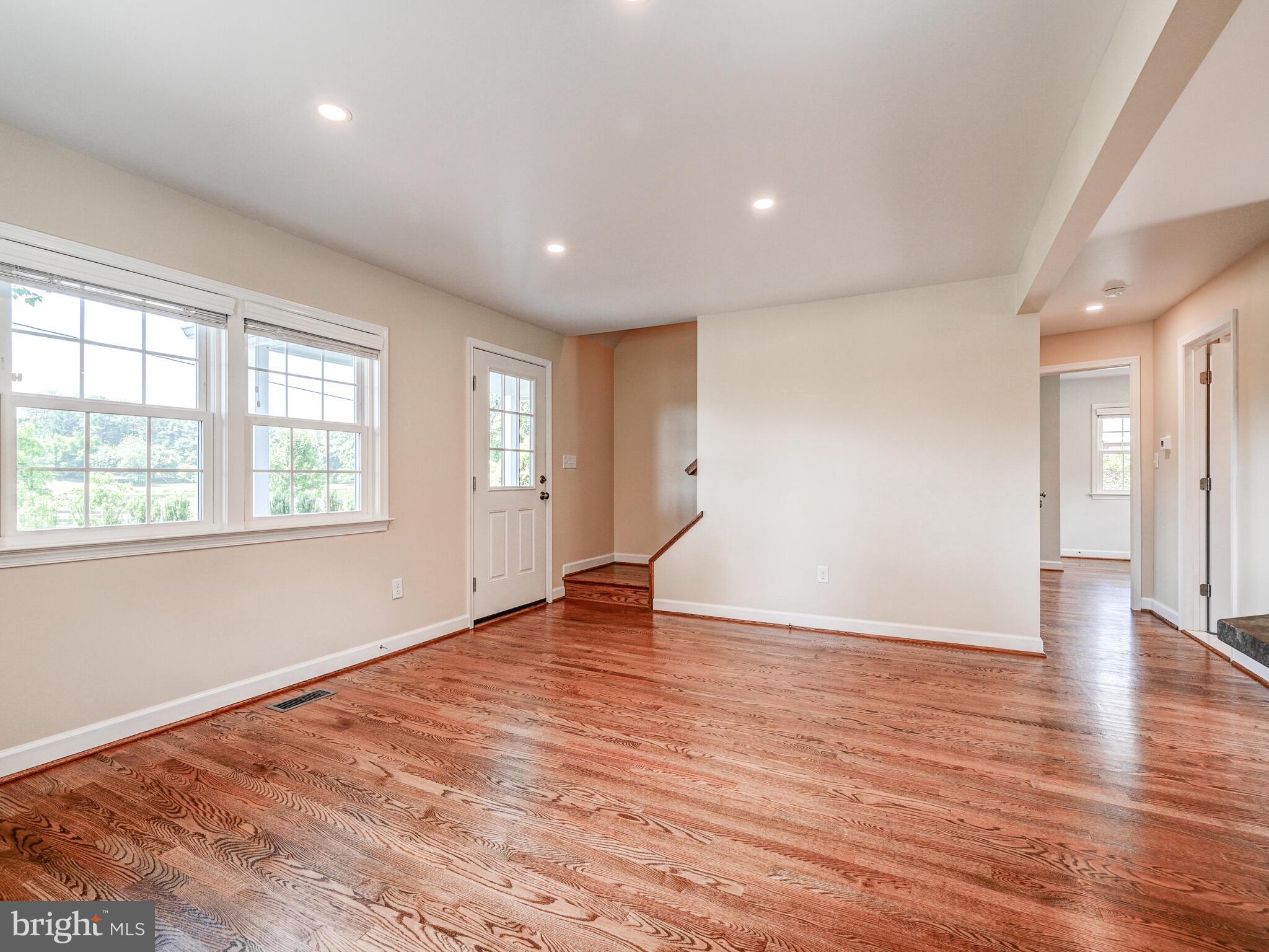 3322 Hess Road Monkton, MD 21111 - Photo 19 of 22 an empty room with wooden floor and windows