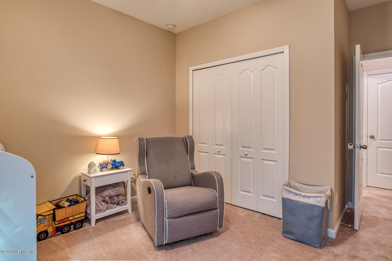 86 Crown Colony Road St. Augustine, FL 32092 - Photo 25 of 48 Neutrally painted guest bedroom